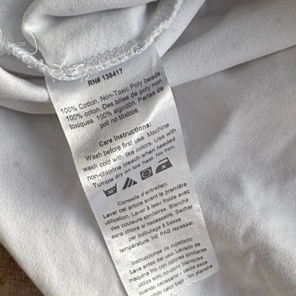 Nested Bean Cream White Sleep Sack with Subtle Dot Pattern
